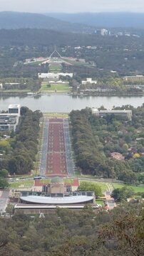 A panoramic view from the famous Mount Ainslie Lookout over Canberra, with Anzac Parade's long, runway-like axis leading to Parliament House, Australian Capital Territory, Australia.