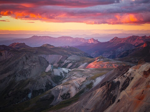Stunning sunset glow over expansive mountain landscape