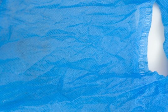 Wrinkled blue non woven protective fabric material texture for medical apparel