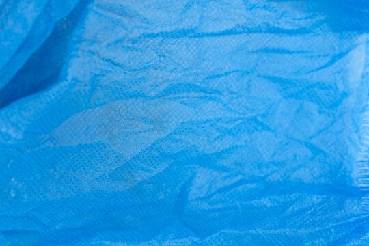 Wrinkled blue non woven protective fabric material texture for medical clothing