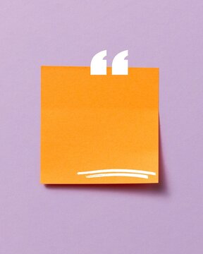 Minimalist quote background with orange sticky note and white quotation mark on purple surface