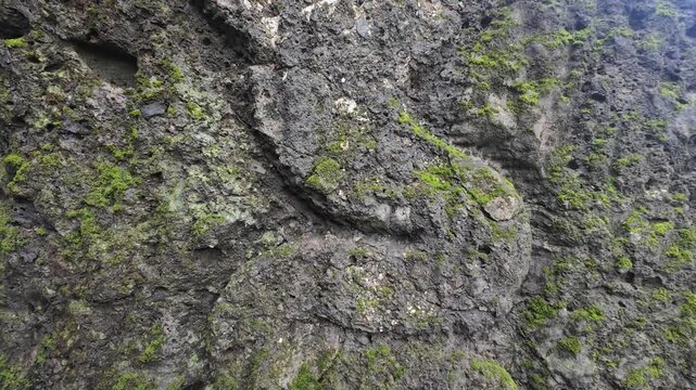 Close Up of Eroded Serpent Naga Relief Relief Carved on Outdoor Rock Surface at Mahakali Caves