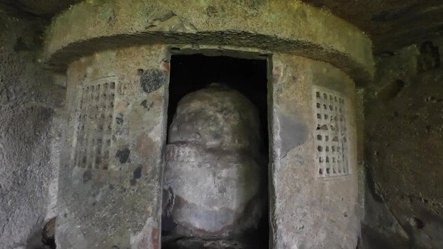 Buddhist Rock Cut Chaitya Hall and Central Stupa Enclosure with Wall Relief Carvings at Mahakali Caves