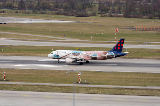 Brussels Airlines passenger airplane type Airbus A320-214 registration OO-SNM Atomium livery taking off from Swiss Z&uuml;rich Airport. Photo taken February 22nd, 2026, Zurich Airport, Switzerland.