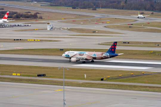 Brussels Airlines passenger airplane type Airbus A320-214 registration OO-SNM Atomium livery taking off from Swiss Z&uuml;rich Airport. Photo taken February 22nd, 2026, Zurich Airport, Switzerland.