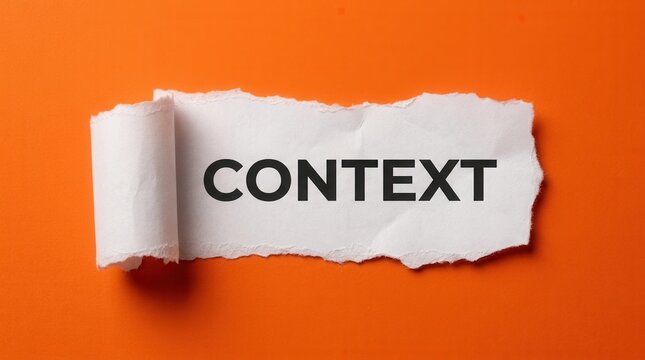 The word context on torn paper highlighted by a bright orange backdrop with ample space for writing.