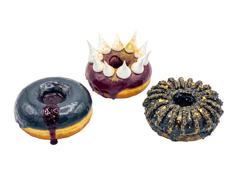 Exquisite dark gourmet donuts featuring meringue spikes, rich dripping glaze.