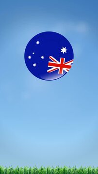 Bouncing Soccer Ball with Australian Flag Pattern Over Green Grass