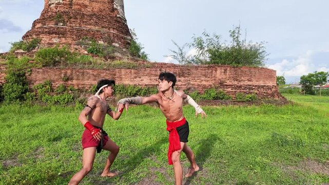 Muay Boran Fighters Sparring Outdoors at Ancient Ayutthaya Temple Ruins