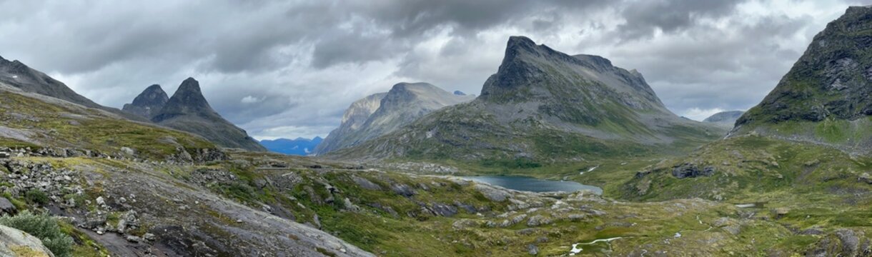 Rugged mountain peaks in remote northern landscape near Rauma, M&oslash;re og Romsdal, Norway, August 2025