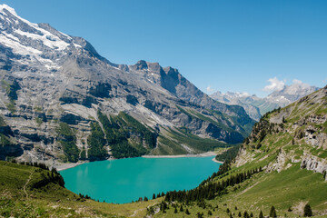 Fototapeta premium Discover the breathtaking beauty of Oeschinensee in Kandersteg, Switzerland