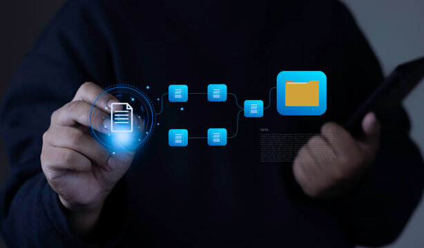 Enterprise resource planning and document workflow management concept with user pointing at glowing document flowchart leading to data folder icon on dark background.