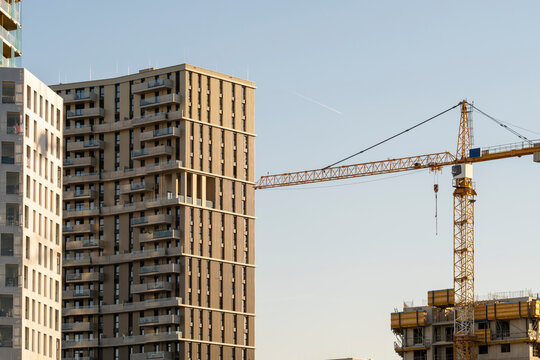 Construction crane stands beside modern residential buildings in Nordbahnviertel Vienna Austria showing architecture and ongoing urban development in the district