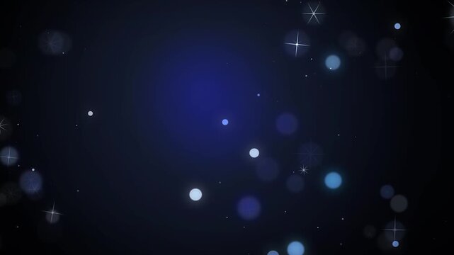 Magical sapphire blue glitter particles and glowing stars drifting slowly on a dark background loop animation