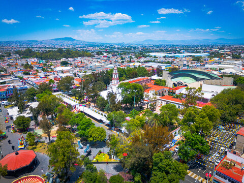 Aerial view of San Cristobal Ecatepec with church, plaza and auditorium
