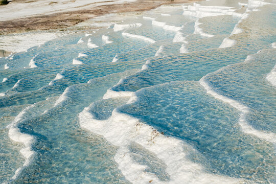 Stunning travertine terraces and turquoise pools in Pamukkale, Turkey