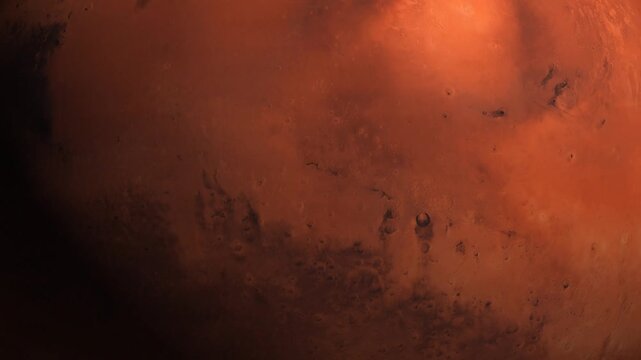 Close up view of the planet Mars surface with craters and rocky terrain in deep space.