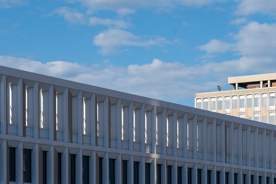 White facade and building pattern create abstract urban architecture with sky geometry and clean exterior repetition in contemporary lines