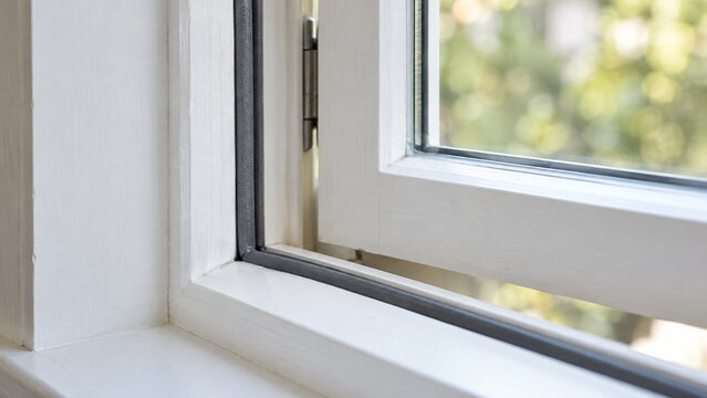 Continuous weatherstripping at an open window corner