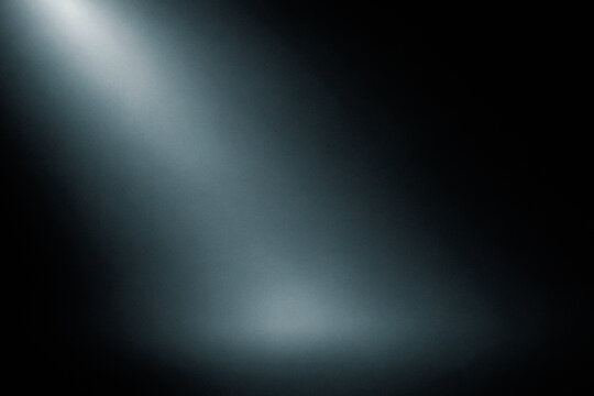 Black and gray grainy gradient with soft teal light wave background
