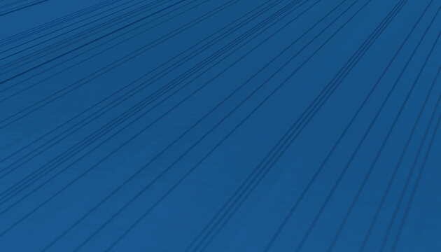 Blue surface with dark linear shadows creating geometric abstract