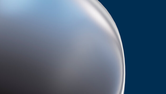 Close-up of a shiny soap bubble with iridescent surface and blue