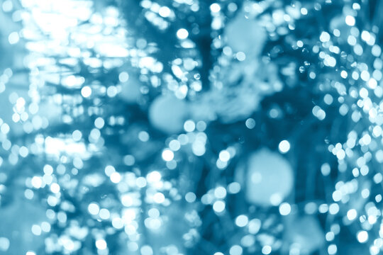 Golden New Year bokeh, abstract background with blurred circles.