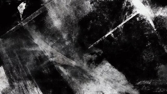Abstract black and white texture with rough brush strokes and grunge elements.