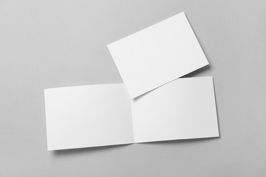Different blank brochures on white background