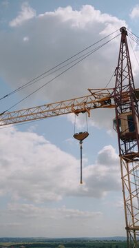 Tower crane against blue sky