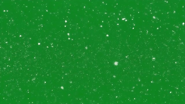 Falling snow overlays on black and green backgrounds.