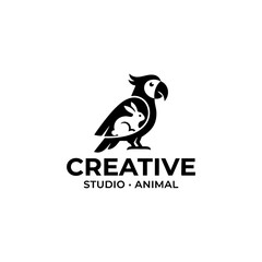 Obraz premium Parrot and rabbit logo design with negative space graphic icon on white background