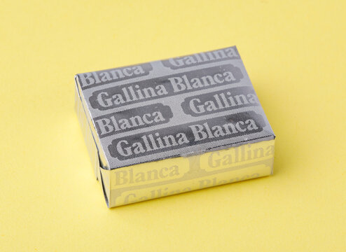 Gallina blanca bouillon cube on yellow background