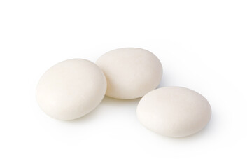 Obraz premium Three white sugared mint candies on a clean background