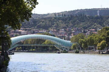 Bridge of Peace Futuristic Glass Pedestrian Bridge Over Kura River in Tbilisi Georgia © UMIT