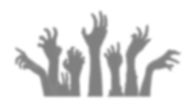 Spooky zombie hands rising up silhouette for Halloween
