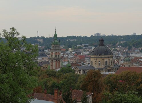 Beautiful panoramic view of the historic city center of Lviv, Ukraine, showcasing its iconic architecture, steeples, and rooftops from a high vantage point