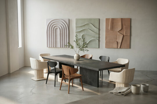 Modern Minimalist Dining Room Interior Featuring Textured Wall Art and Stone Table with Assorted Designer Chairs in a Bright Serene Space