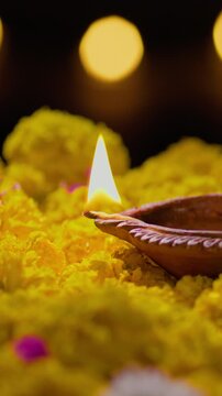 Clay diya lamps lit during diwali celebration, Diwali, or Deepavali, is India's biggest and most important holiday.