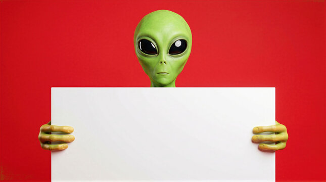 Alien holds a large blank white sign against a solid red backdrop. This extraterrestrial character provides a versatile space for custom text or advertising designs.