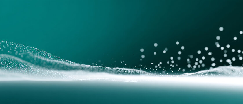 Abstract digital wave of glowing particles floating over a smooth surface with teal background and bokeh effect