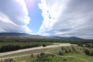Panoramic Valley View of Kura River and Mountains from Uplistsikhe Cave Town, Georgia © UMIT