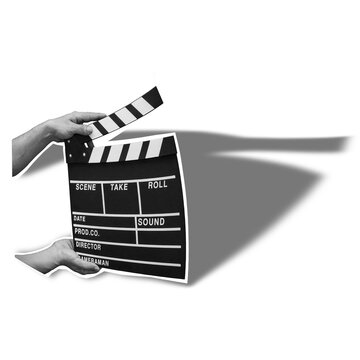 A hand holds a clapperboard with scene, take, and roll details. This item is used in film production to mark the start of a scene. It has a black and white design.
