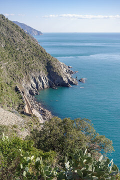 Coastal railway line winding along a cliff