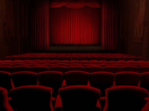 Empty red theater seats facing a closed stage curtain.