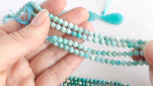 Faceted turquoise gemstone beads display polished natural textures and brilliant teal tones, creating an exceptional visual presentation for custom artisan jewelry making and ornamental crafting suppl