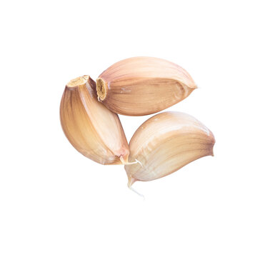 Peeled garlic isolated on white background