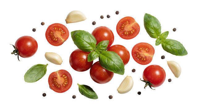 Fresh cherry tomatoes basil leaves garlic cloves and peppercorns scattered, isolated on transparent background