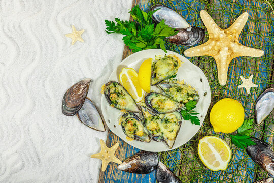 Baked mussels with cheese, herbs, and lemon on a plate, white-sand beach background