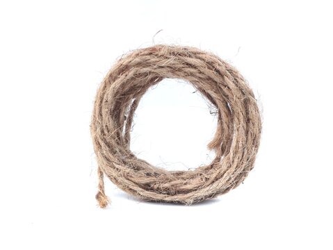 Rolled roll of brown hemp twine isolated on white background. Ideal concept for craft materials, natural fiber packaging, rustic cordage, DIY hobbies, tying, binding, and eco friendly packaging